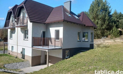 Traumhaus mit Seeblick: Doppelhaushälfte direkt am Łowyńskie