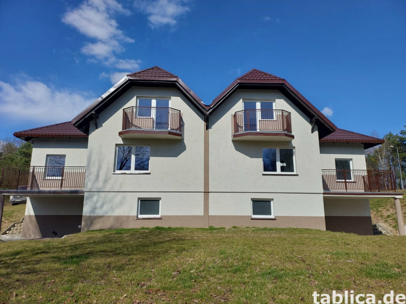 Traumhaus mit Seeblick: Doppelhaushälfte direkt am Łowyńskie 1