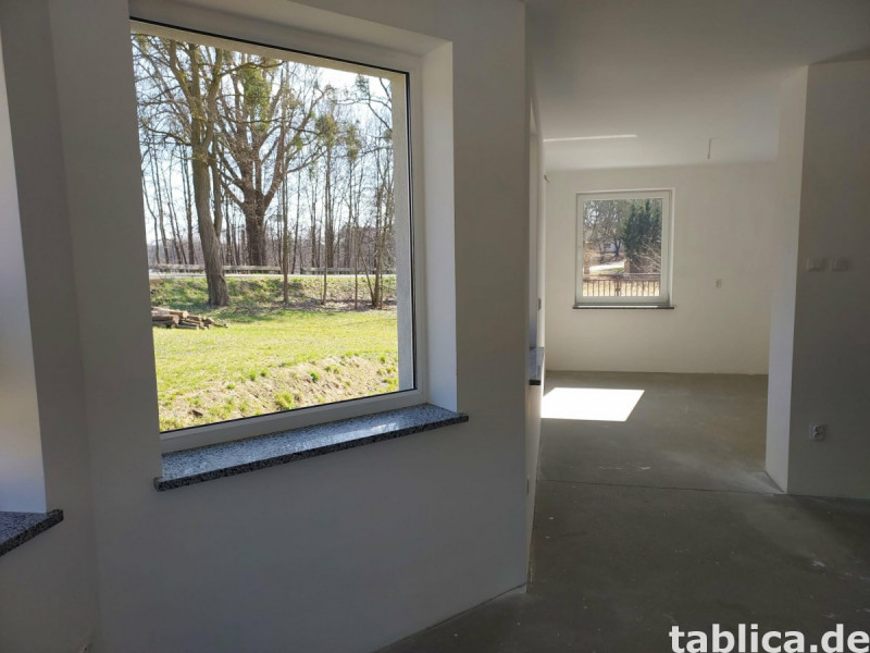 Traumhaus mit Seeblick: Doppelhaushälfte direkt am Łowyńskie 12