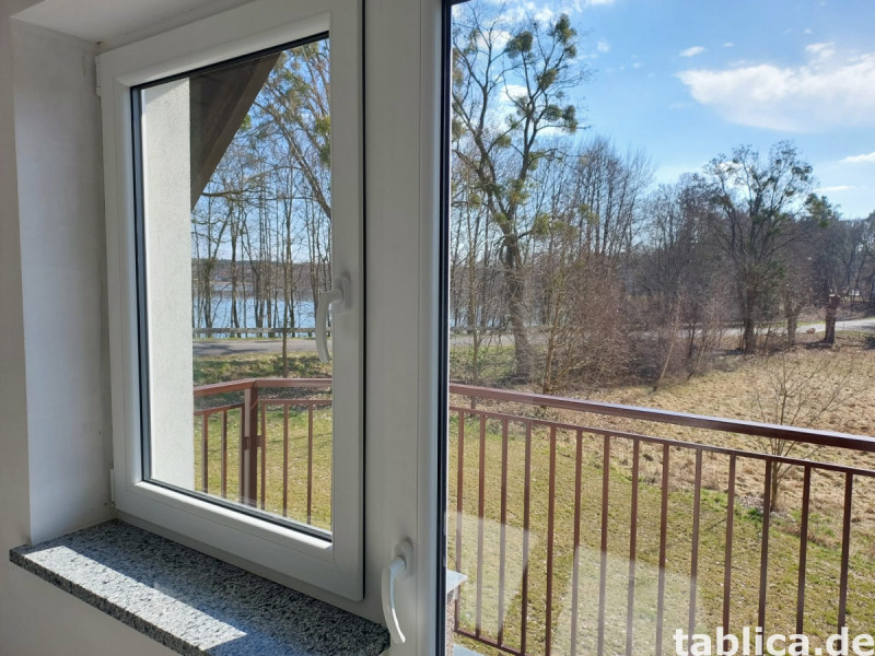 Traumhaus mit Seeblick: Doppelhaushälfte direkt am Łowyńskie 13