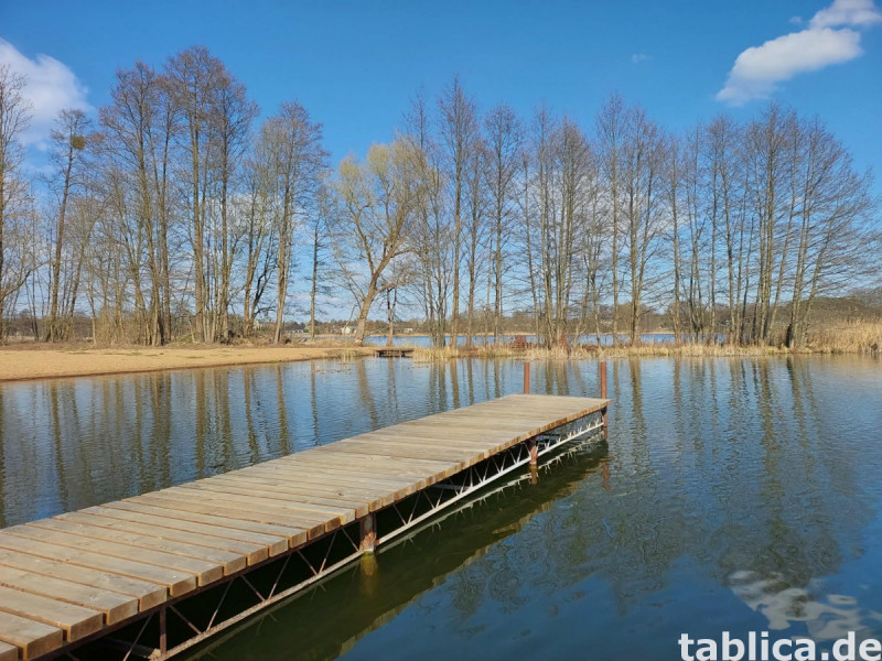 Traumhaus mit Seeblick: Doppelhaushälfte direkt am Łowyńskie 16
